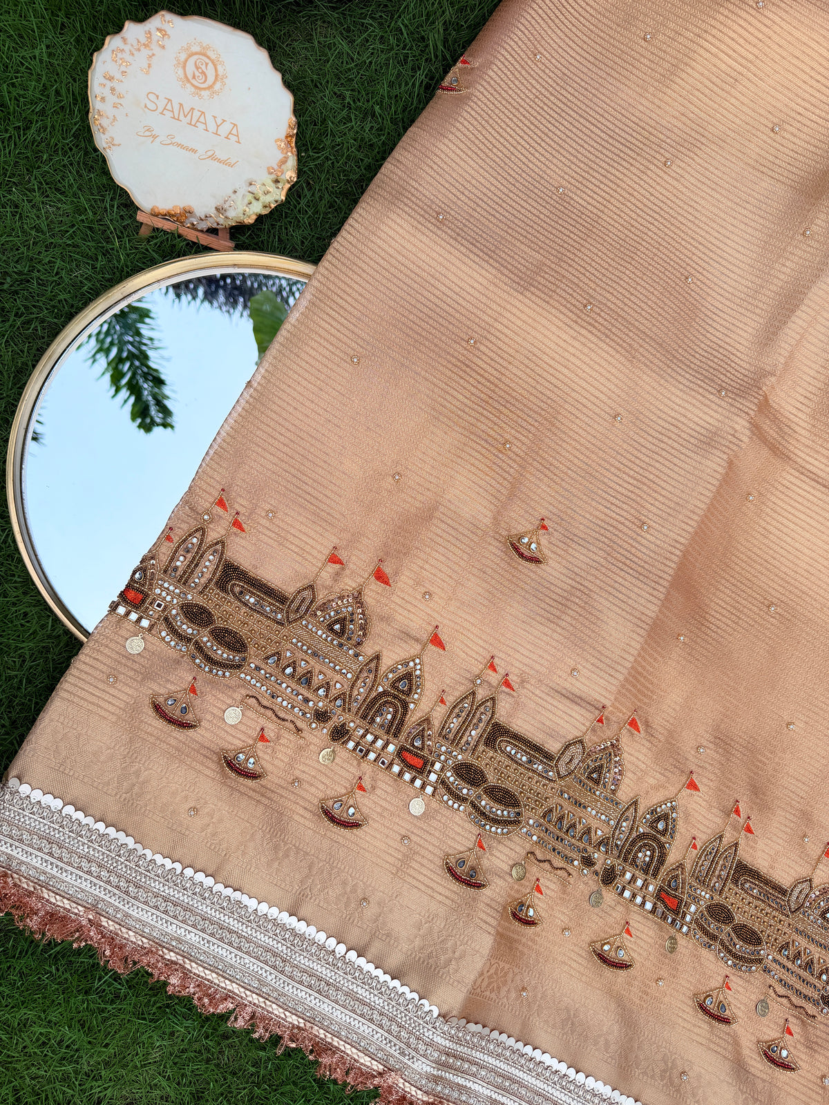 Peach Beige Organza Saree with Intricate Procession Motif & Cutwork Border Embroidery