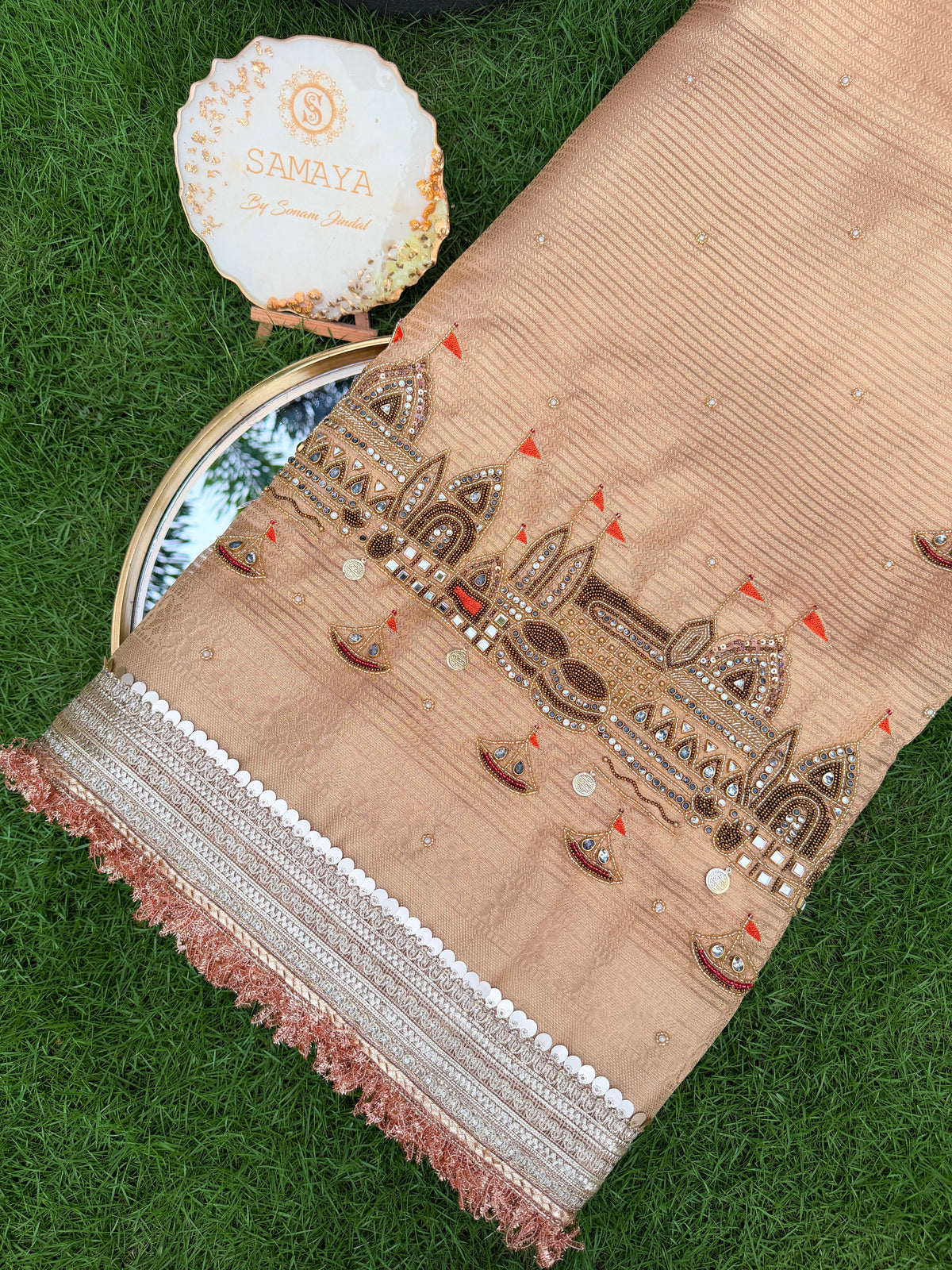 Peach Beige Organza Saree with Intricate Procession Motif & Cutwork Border Embroidery